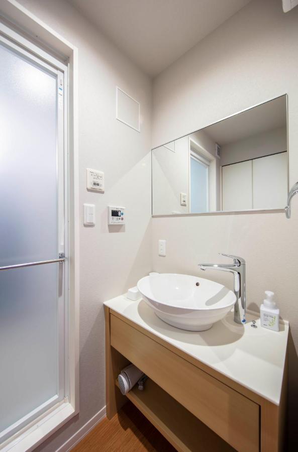 Grand Base Kurashiki Chuo Aparthotel Buitenkant foto