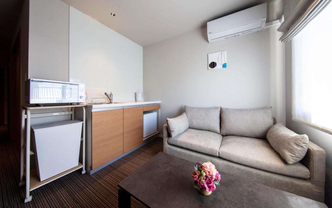 Grand Base Kurashiki Chuo Aparthotel Buitenkant foto
